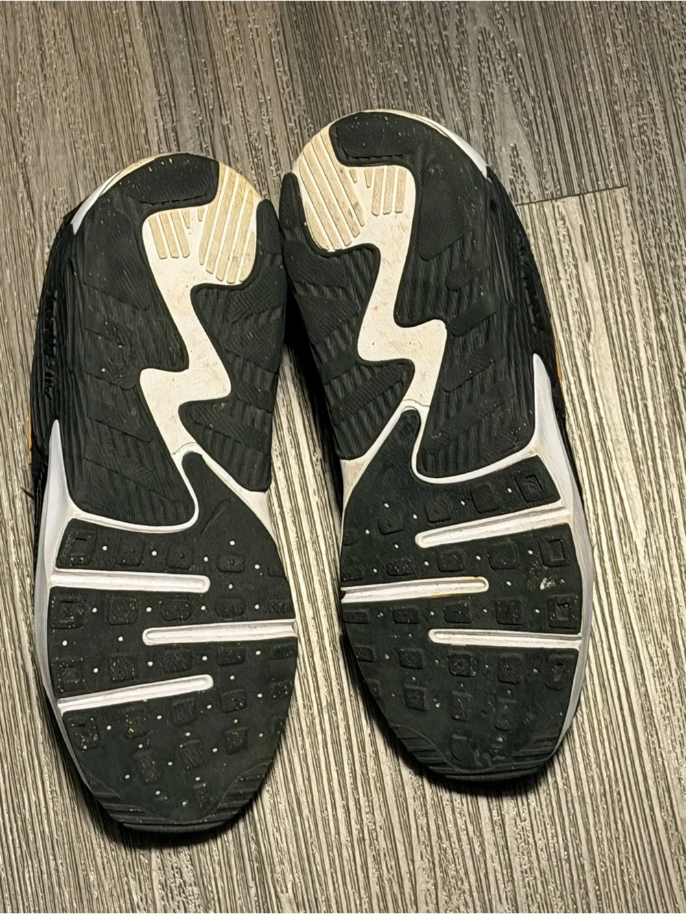 Nike Kids Black Sneakers with Gold Swoosh